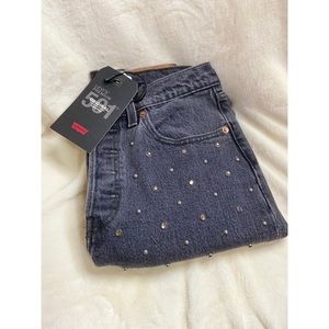 Gray 501 Original cropped Levi jeans.